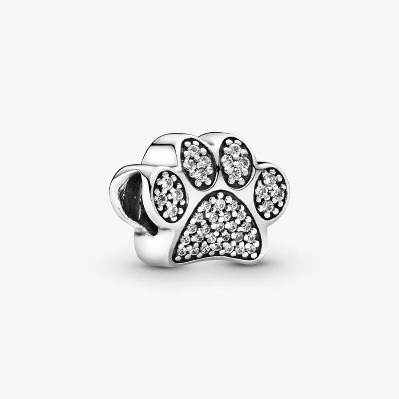 Charm con huella de pata brillante